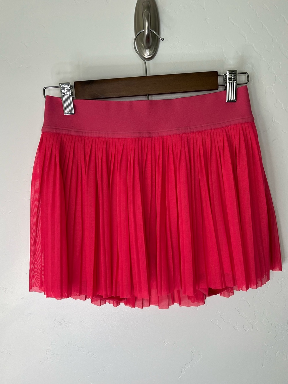 Lululemon Mesh Pleats Mid-Rise Mini Tennis Skirt in the color “Lip Gloss”